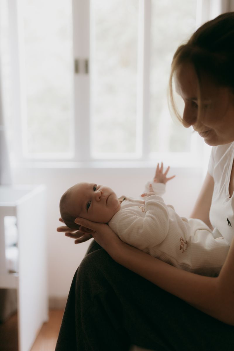 A tender moment between mother and newborn